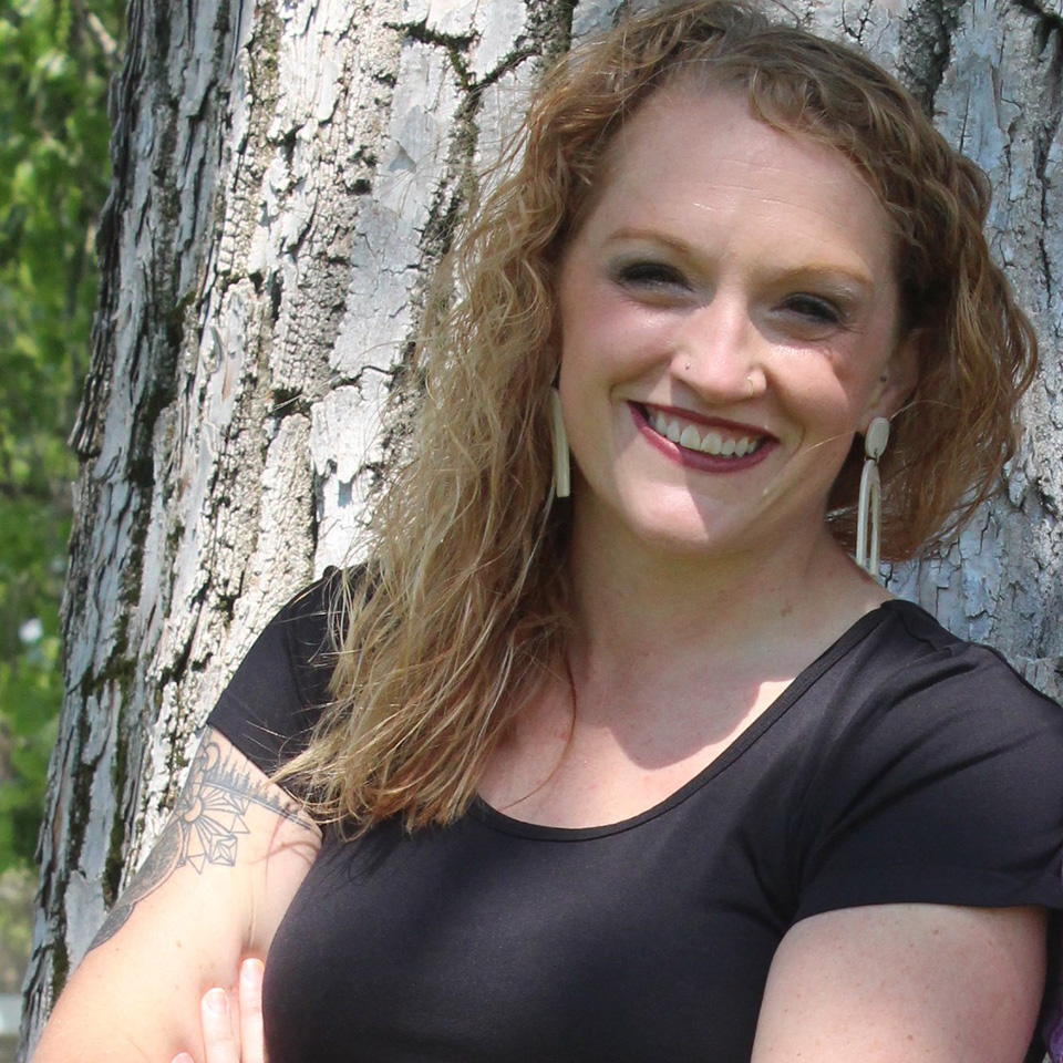 Miranda Stoll Miranda Stoll leaning against a tree